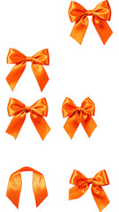 Orange ribbons, varying sizes & styles on black background