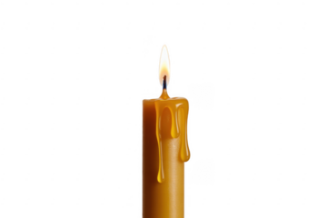 Single lit beeswax candle with dripping wax and bright flame isolated on a transparent background