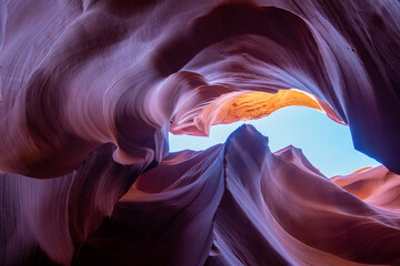 Antelope Canyon offers a breathtaking view with its vibrant rock formations and narrow passageways on Arizonas Indian reservation. The place is a mustvisit for adventure seekers. Popular place in USA.