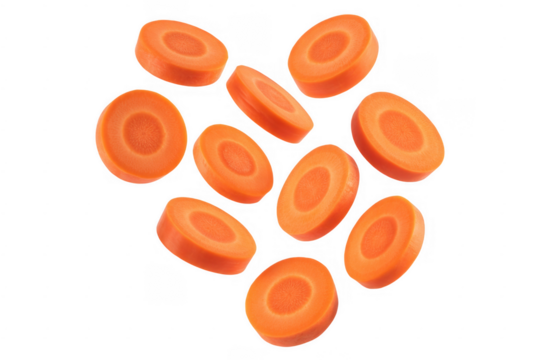 Sliced orange carrot rounds scattered against a black background isolated on a transparent background