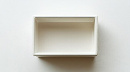 A plain, white rectangular box is shown from above.
