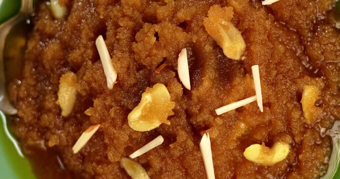 Moong dal halwa is a classic Indian sweet dish made with moong lentils, sugar, ghee and cardamom powder