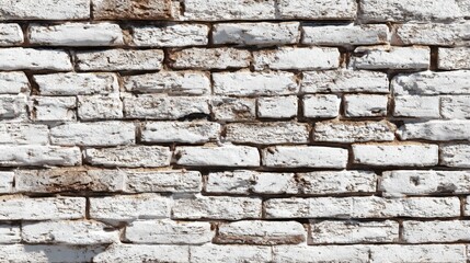 Old textured white brick wall surface with aged rustic pattern showing cracks, rough details and natural weathered construction material texture on white background

