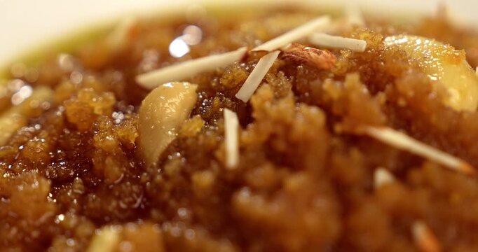 Moong dal halwa is a classic Indian sweet dish made with moong lentils, sugar, ghee and cardamom powder