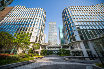 Stunning Modern Architecture in Urban Landscape with Lush Greenery and Vibrant Elements