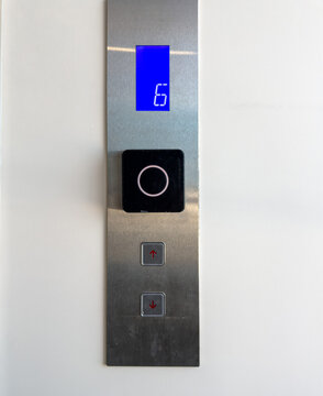 Modern Minimalist Elevator Control Panel with Digital Display and Touch Features
