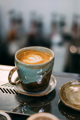 Close up hot coffee cup in cafe