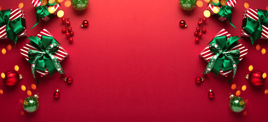 Merry Christmas and Happy Holidays greeting card, frame, border. New Year. Red Christmas ornaments...