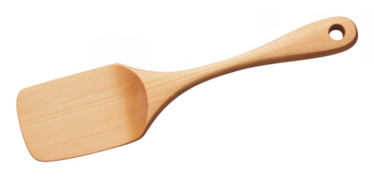 Natural wood spatula with a hole in the handle for hanging isolated on a transparent background
