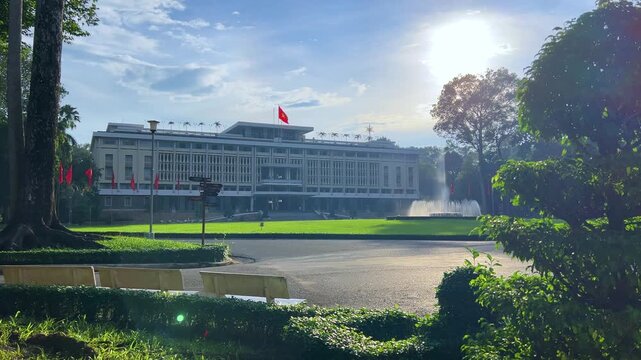 Ho Chi Minh City, Vietnam - September 18, 2025: View of the Independence or Reunification Palace, formerly Saigon. Dinh Choc Lop. A beautiful fountain sprays in front of the palace in bright daylight.