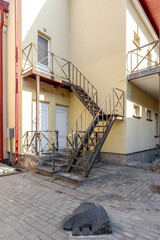 Old Metal Staircase on Residential Building Exterior
