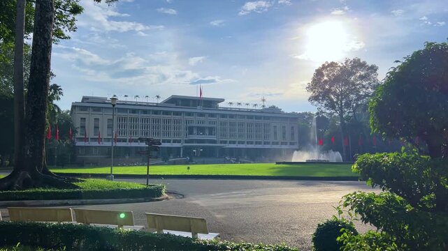 Ho Chi Minh City, Vietnam - September 18, 2025: View of the Independence or Reunification Palace, formerly Saigon. Dinh Choc Lop. A beautiful fountain sprays in front of the palace in bright daylight.