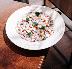 Delicious seafood dish served in a cozy restaurant setting during daytime
