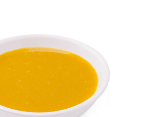 Delicious homemade mustard sauce in a white bowl on a clean surface