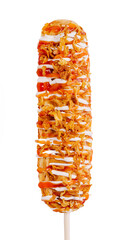 Delicious corn dog topped with crunchy toppings and drizzle