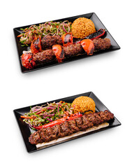 Delicious kebab platter with rice and grilled vegetables served in a restaurant