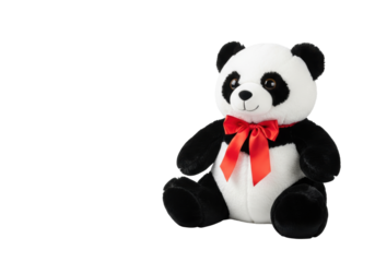 Oversized cute plush panda bear with glossy button eyes and a bright red satin bow, on a transparent studio background with copy space, adorable innocence and gift concept