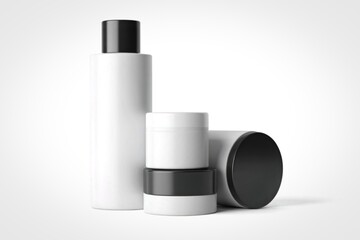 Minimalist white cosmetic bottles and jars with black lids
