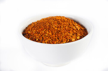dried cayenne pepper in white bowl