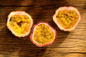 ripe passion fruit on wood background