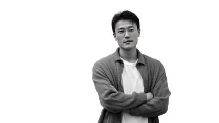 Confident Portrait: A black and white portrait of a person with arms crossed, exhibiting a calm and self-assured demeanor, captures the essence of poise and self-confidence.