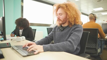 Operator working and smiling at the camera - Powered by Adobe