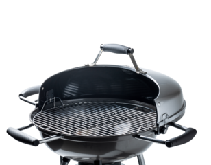 Open charcoal grill sits on white surface, ready for cooking delicious food outdoors on a sunny afternoon, creating a delightful barbecue experience.