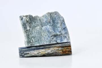 A raw, blue Kyanite mineral specimen with a bladed crystalline structure. Kyanite is an aluminum silicate often found in metamorphic rock, prized for its blue color.