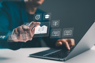 A person interacts with digital icons representing books and education while using a laptop, showcasing a blend of technology and learning.