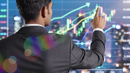 Businessman in suit pointing at financial trading charts with upward trend arrows and candlestick patterns. Market analysis and investment strategy concept with digital display, growth indicators - Powered by Adobe