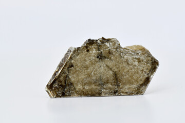 thin, translucent sheet of dark brown mineral, Biotite or Mica, exhibiting perfect cleavage and flaky structure, isolated on white background. Suitable for geology and earth science studies.