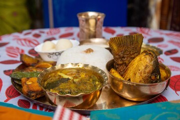 Close-up of macher matha fish head served in traditional Bengali wedding vat kapor ritual