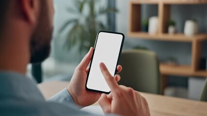 Man uses smartphone with blank screen in modern office, showcasing technology and connectivity in business environment. - Powered by Adobe