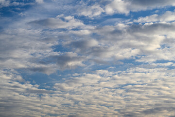 A Serene and Tranquil Sky, Adorned with Soft Clouds and Beautiful Blue Hues Above