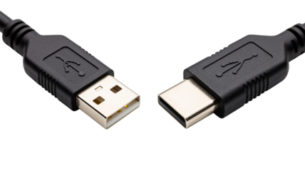Close up shot of usb type a and type c cables positioned facing each other on black
