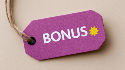 Purple tag with 'BONUS' and a yellow star on a beige background.