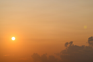 Enjoy the serene beauty of a stunning sunset over a misty landscape, a moment for peace