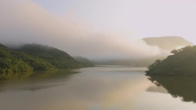 Misty Morning Over Calm Lake At El Carrizo Reservoir In Jalisco, Mexico. panning shot