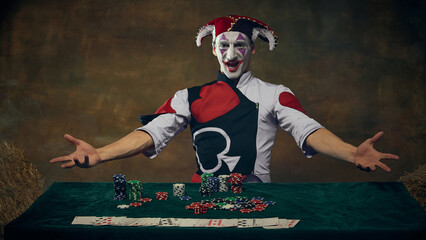 Joker character presenting casino chips and playing cards at gaming table. Concept of gambling entertainment, casino branding, online gaming promotion, and thematic character design.