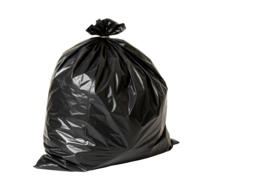 Black garbage bag sealed with tie closed top ready for waste disposal and trash collection for household and commercial refuse management