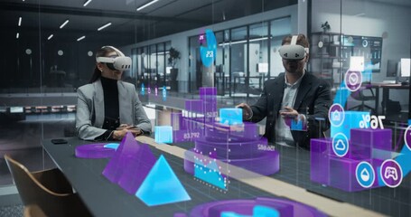 Executive and Analyst in VR Headsets Manipulate Floating Holographic Charts, and Icons in a Glass-walled Office, Using Immersive Virtual Reality Analytics to Explore Financial Data, Performance Growth - Powered by Adobe