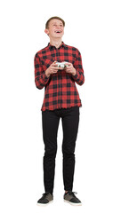 Astonished and overjoyed teen guy play video games, full length portrait isolated on transparent background. Excited buy stand all ears holding a joystick console, having fun in the virtual world
