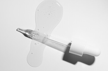 Liquid cosmetic product for the skin or medicine in a pipette.