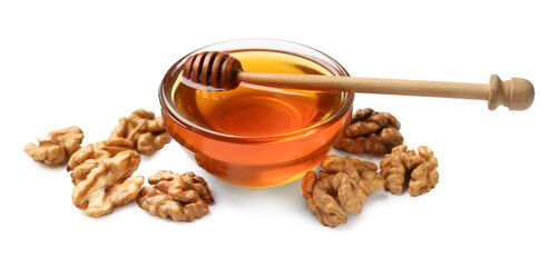 Tasty honey in glass bowl, walnuts and dipper isolated on white
