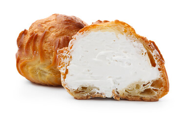 Tasty profiteroles with whipped cream isolated on white