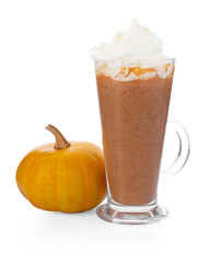 Delicious pumpkin latte with whipped cream in glass and fresh vegetable isolated on white