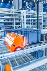 Automation in the warehouse controls a robot loader Robots sort and move boxes