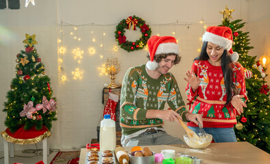 couple lover enjoy Christmas make food and cooking make dessert flour and dough. husband and wife family celebrate party chef dinner on Christmas at home kitchen party with cooking Christmas food