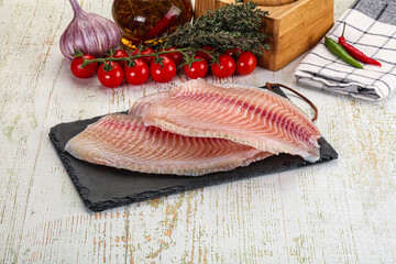 Raw Tilapia fish fillet slice