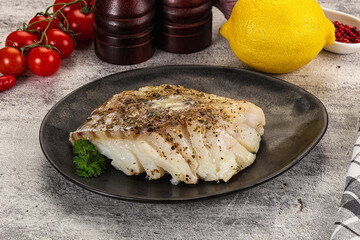 Baked cod fish fillet with spices